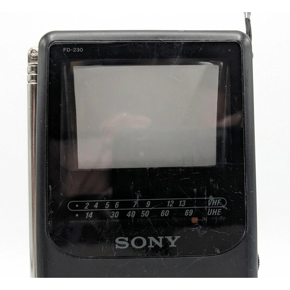 Sony Watchman Model FD-230 Flat Black and White TV, Antenna, Wrist Strap